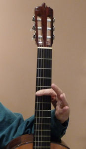 Bar chord on the fifth fret